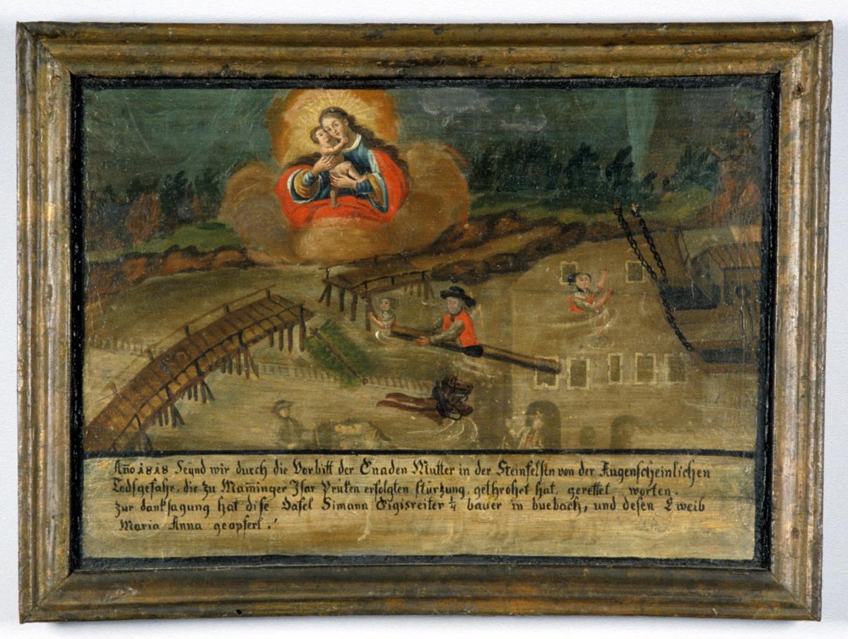 Anno 1818. Seynd wir durch die Vorbitt der Gnaden Mutter in der Steinfelsen von der Augenscheinlichen Todesgefahr, die zu Mamminger Isar Prüken erfolgten stürzung, getrohet hat, gerettet worten. Zur danksagung hat dise Dafel Simann Gigisreiter 1/4 bauer in buebach, und desen Eweib Maria Anna geopfert!