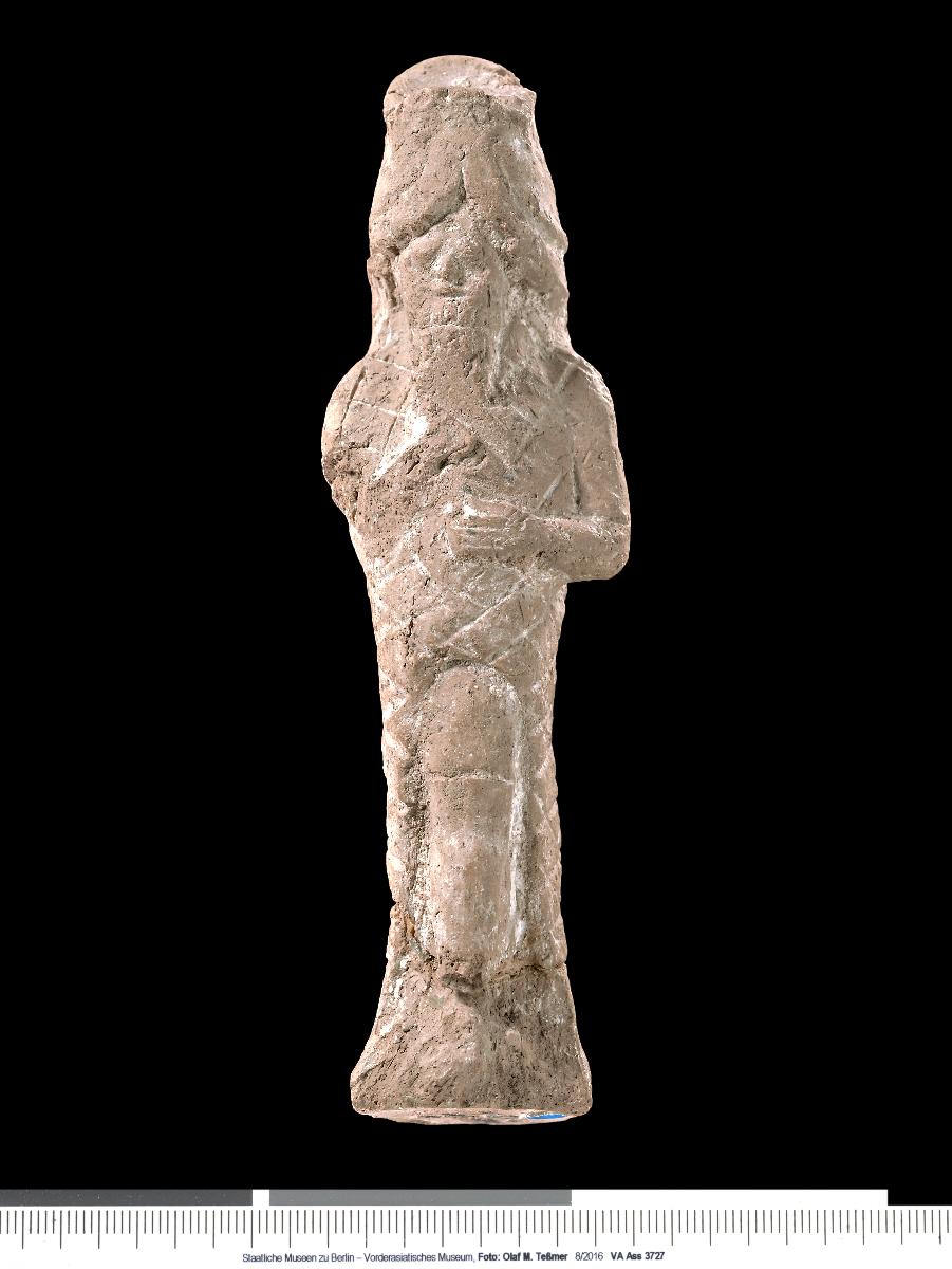Statuette eines Mannes im Fisch-Gewand
