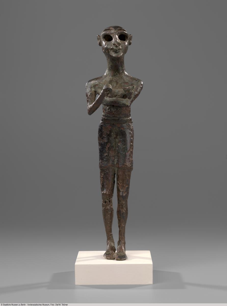 Statuette eines Mannes mit Opfertier
