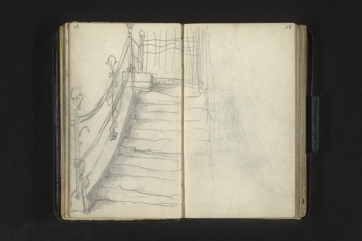 Treppe mit schmiedeeisernem Geländer