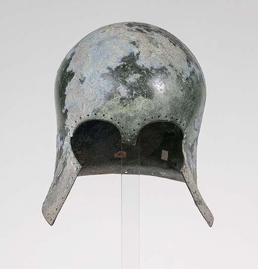 Korinthischer Helm, frühe 2. Stufe, mit linksläufiger Weihinschrift