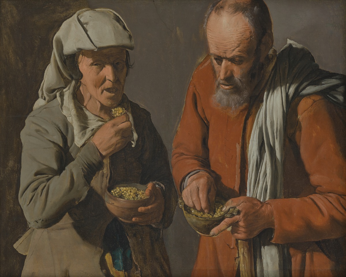 Erbsen essendes Bauernpaar