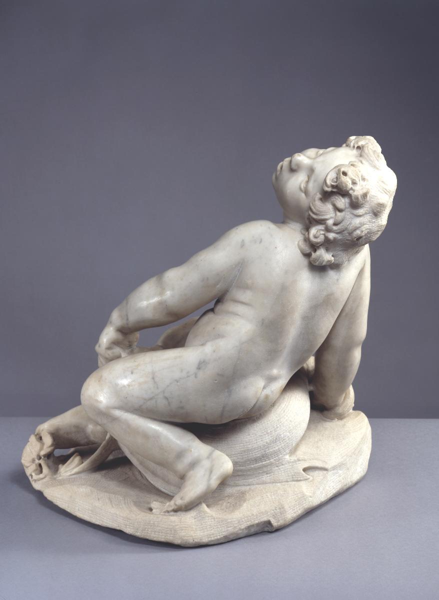 Putto auf einem Delphin