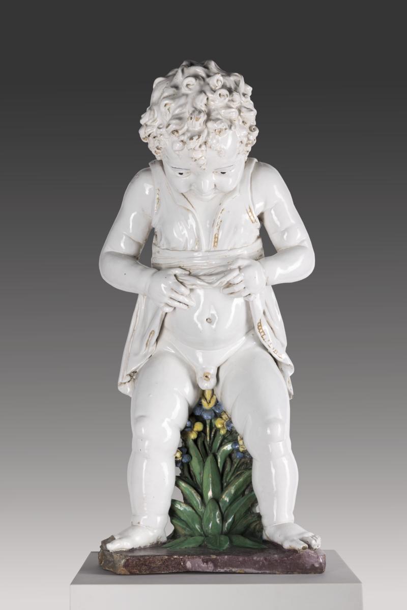 Pinkelnder Knabe als Brunnenfigur