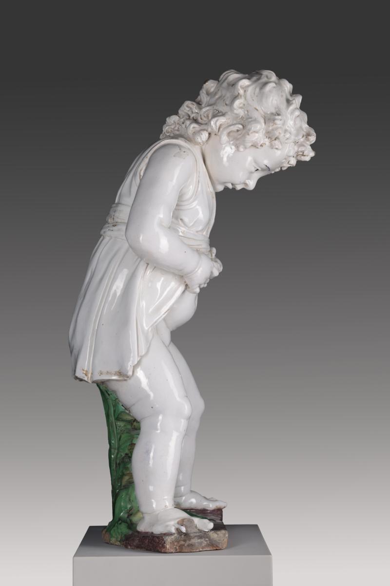 Pinkelnder Knabe als Brunnenfigur