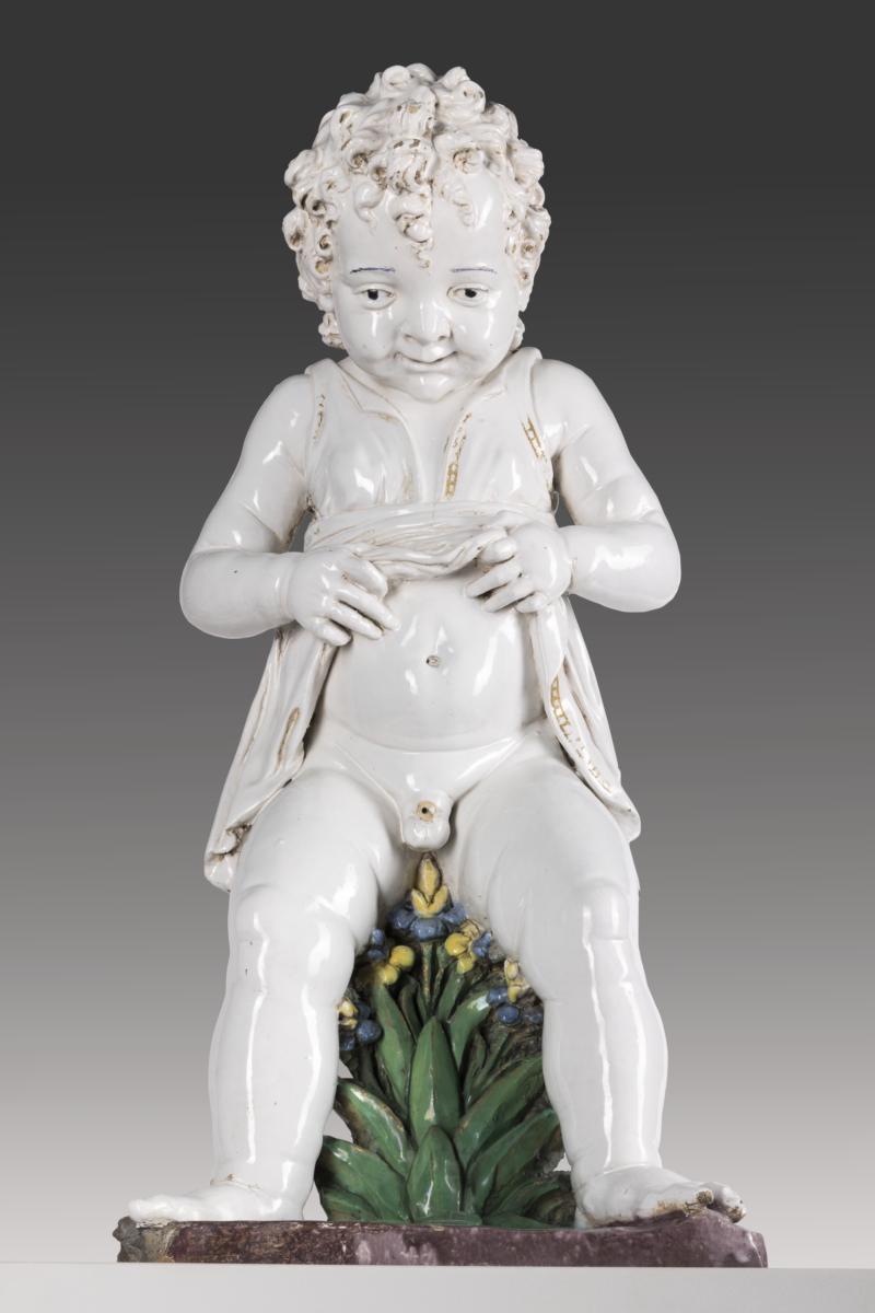 Pinkelnder Knabe als Brunnenfigur