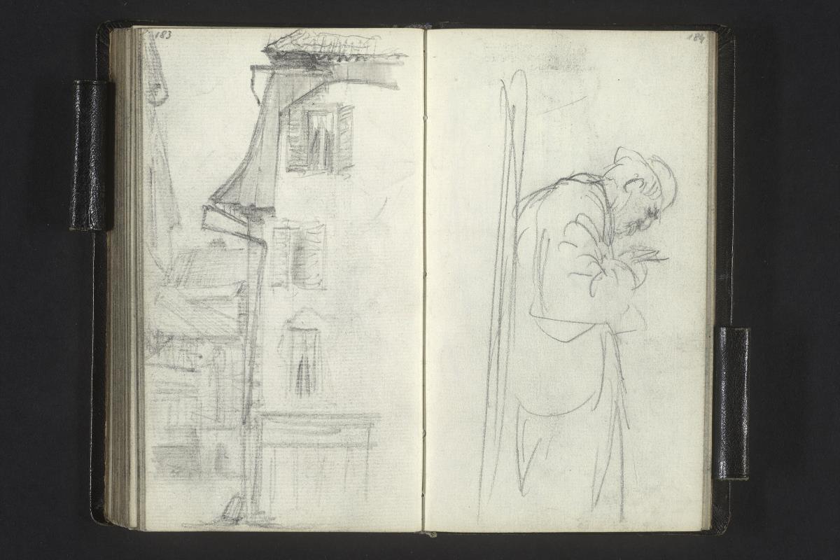 Gasse mit Häusern, Mann stehend in einem Buch lesend