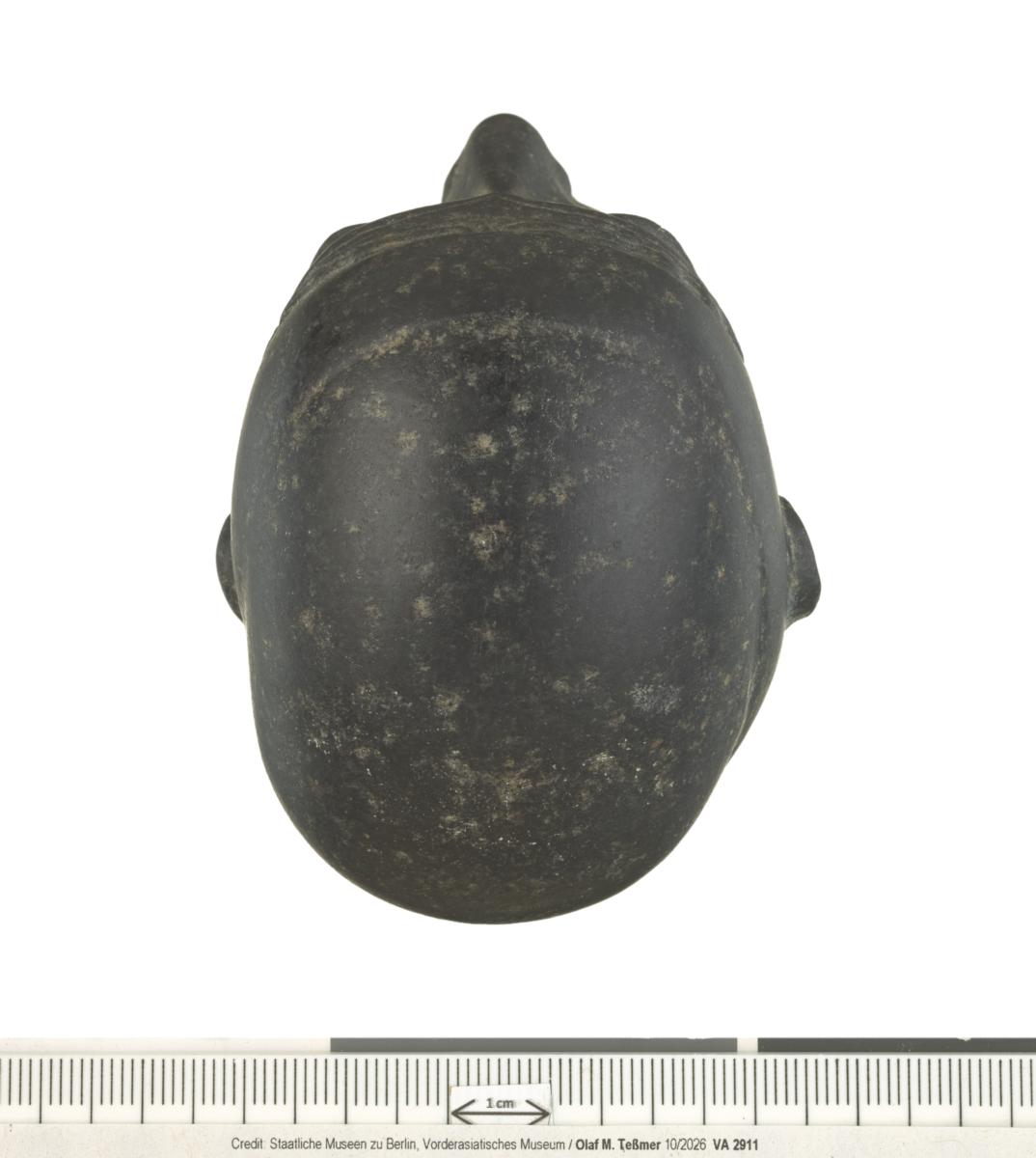 Kopf einer Frauenstatuette