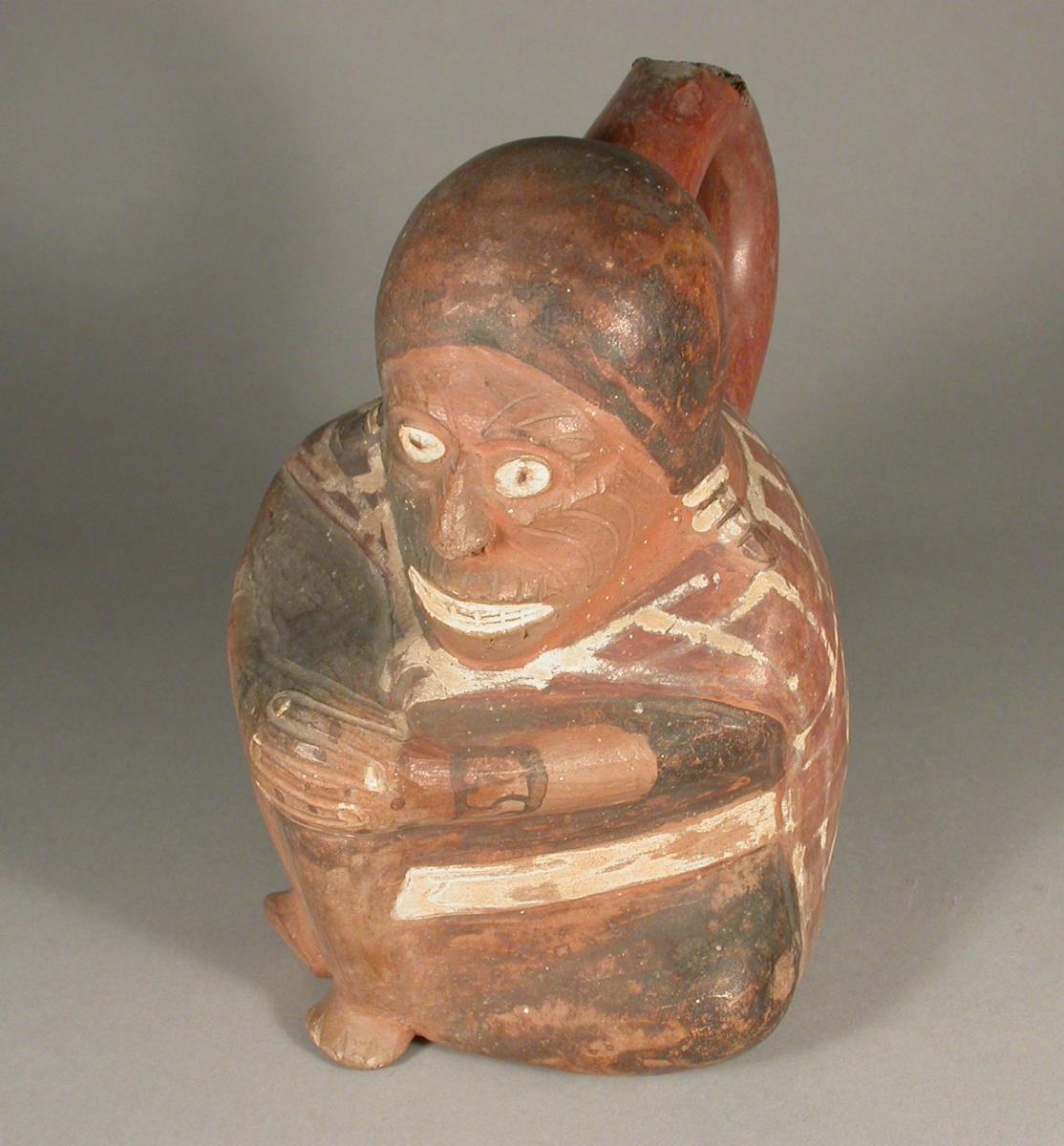 Sitzende anthropomorphe Figur