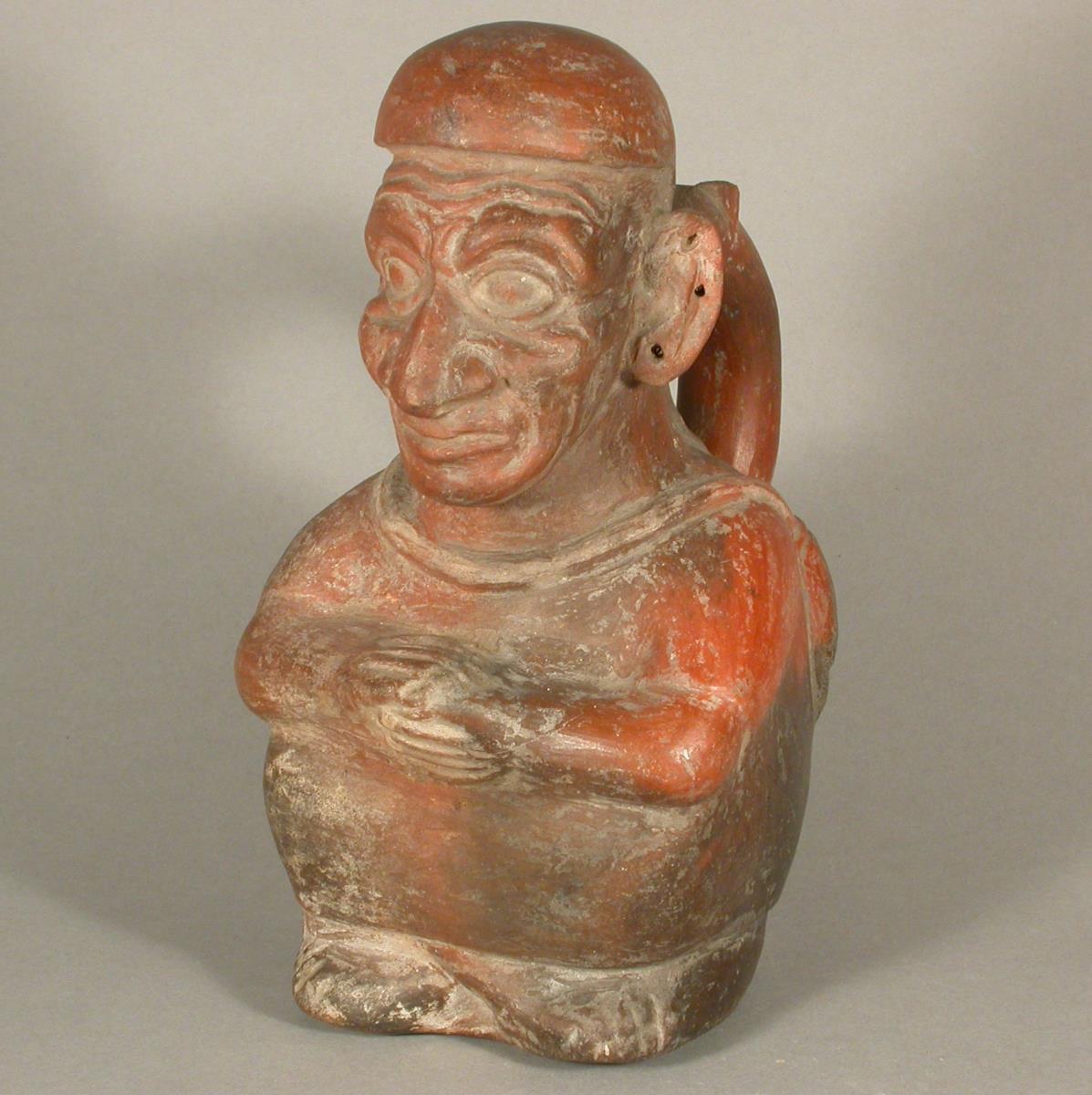 Sitzende anthropomorphe Figur
