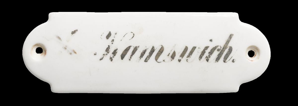 Namensschild "E. Kamswich."