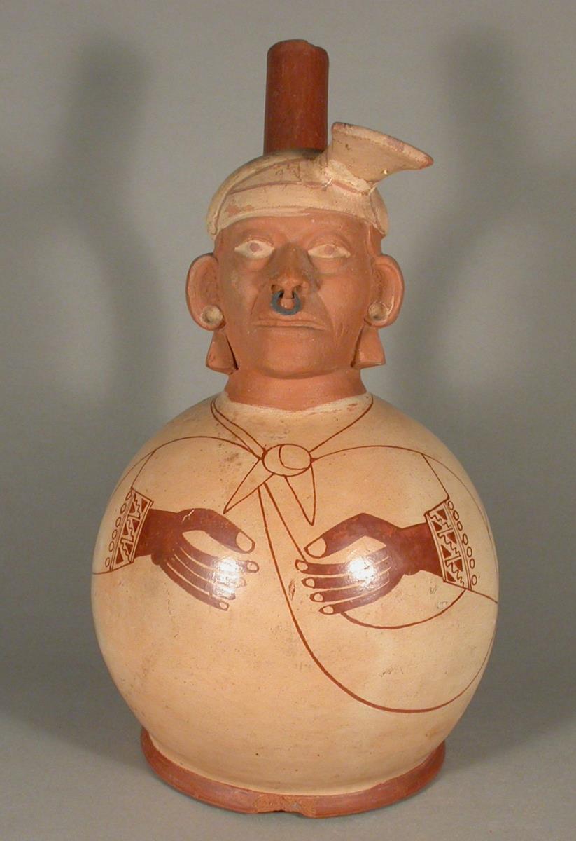Applikation: anthropomorpher Kopf; Fineline Painting: Hände und Obergewand