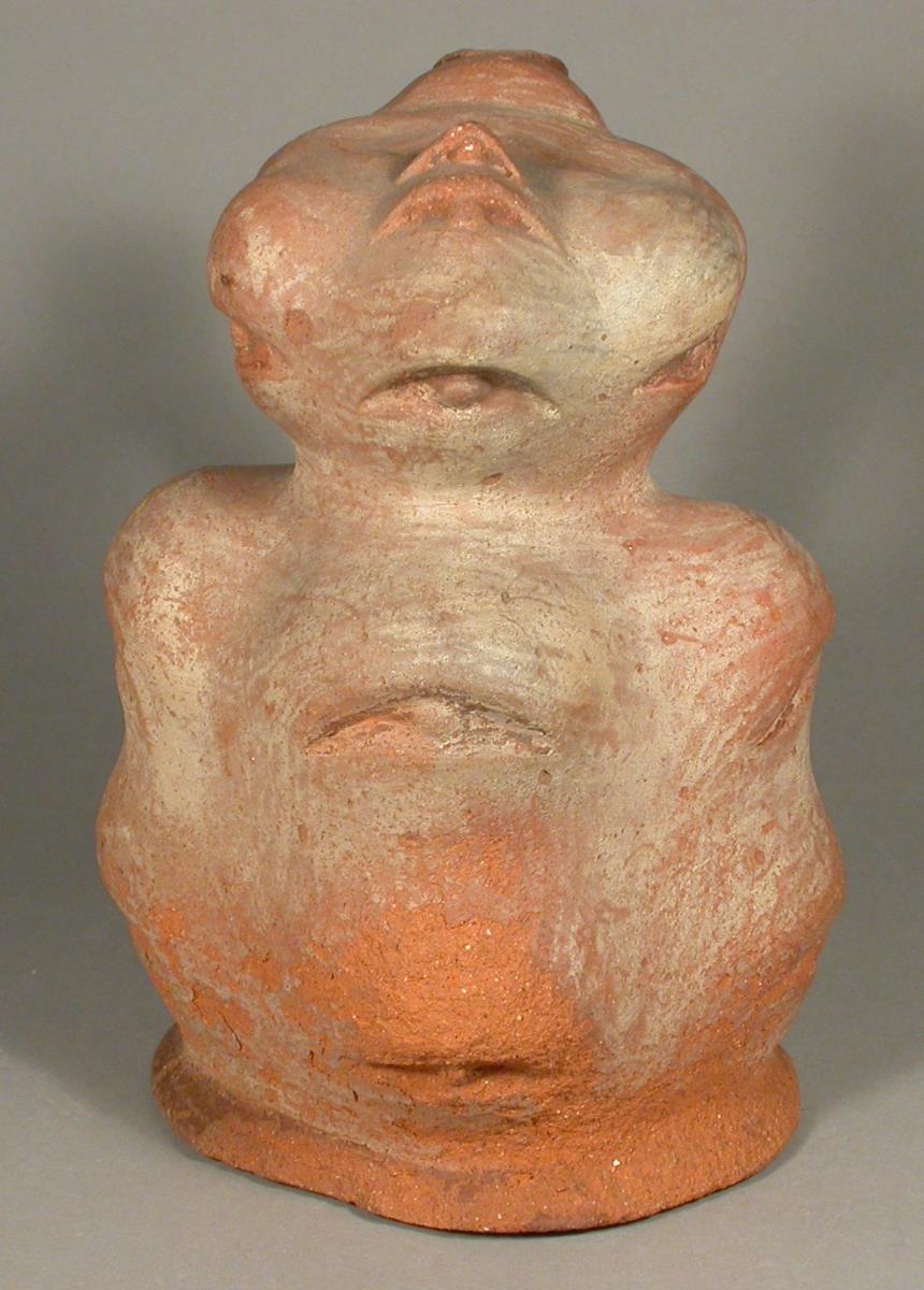 Frucht/Knolle mit anthropomorphem Kopf