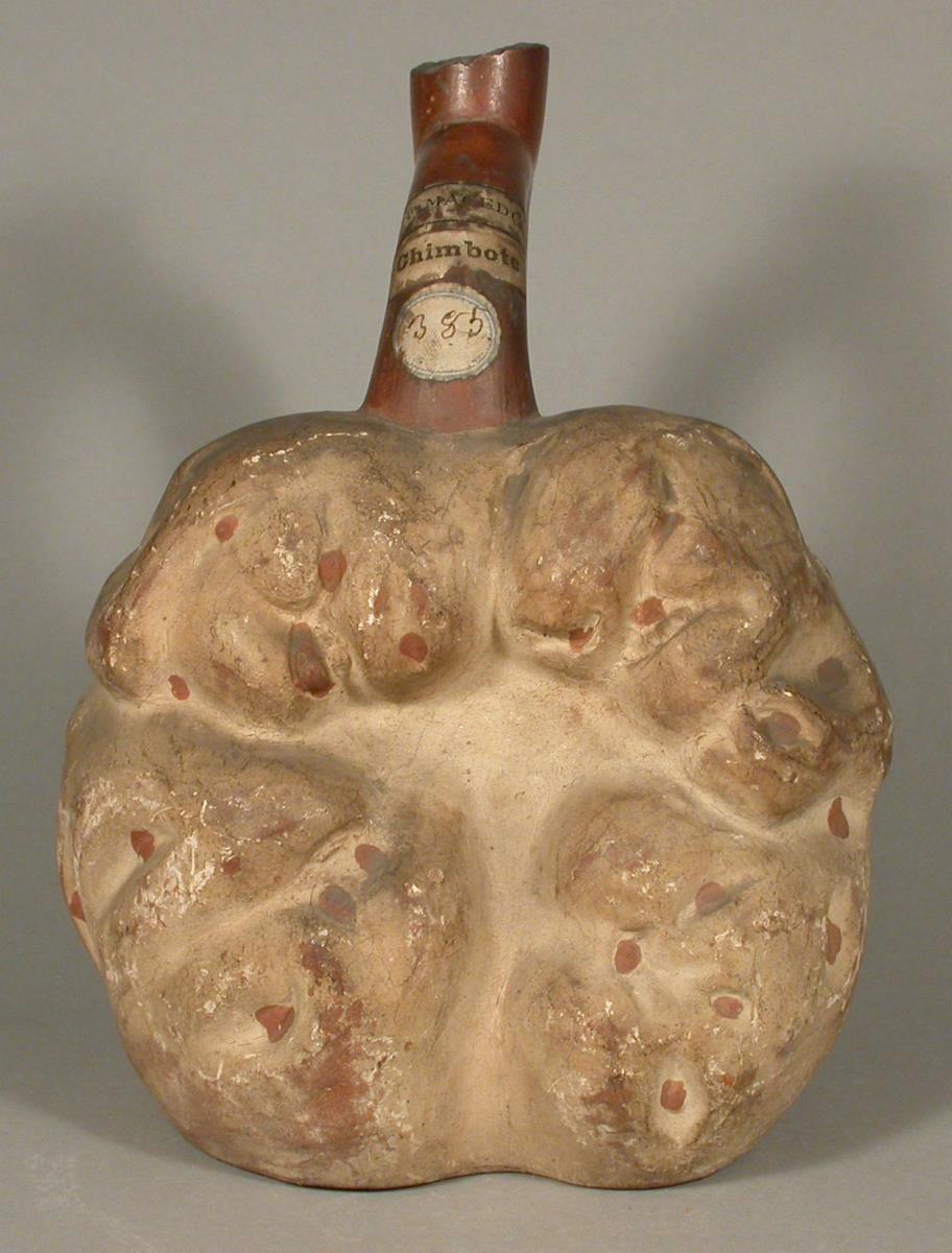 Frucht/Knolle und anthropomorphe Figuren