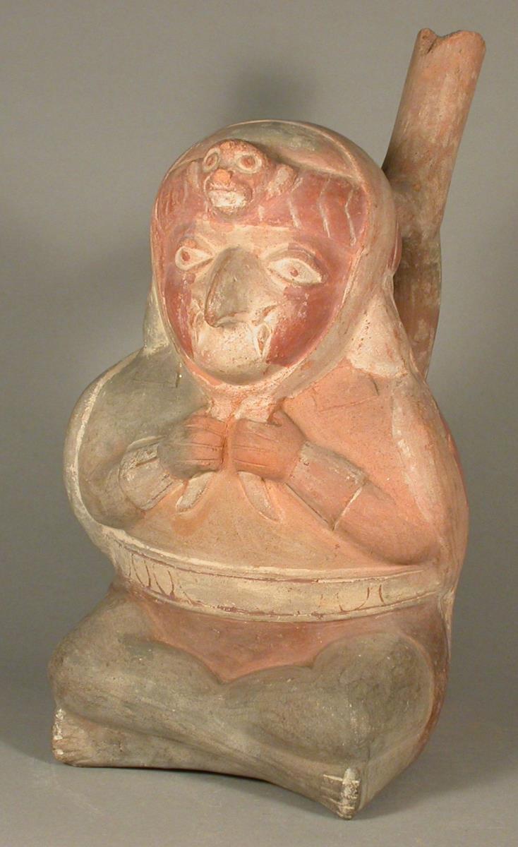 Sitzende anthropo-zoomorphe Figur