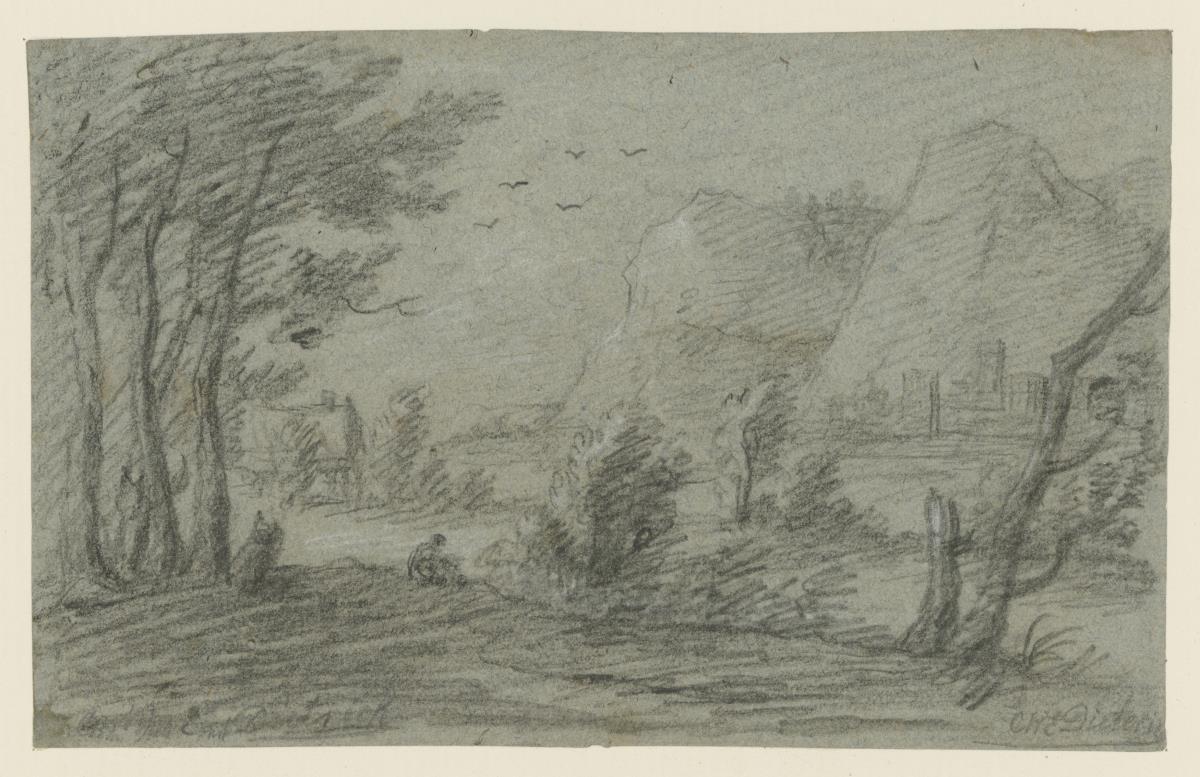 Landschaft mit Ausblick auf eine Stadt und Berge