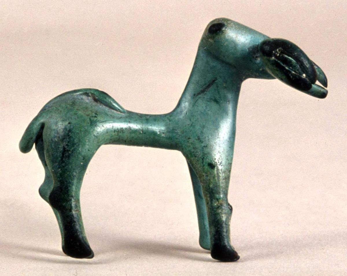 Geometrische Votivstatuette: Löwe mit Beute bzw. "Hund mit Jungem im Maule"