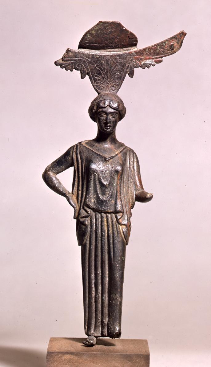 Spiegelstütze in Form eines Mädchens im Peplos