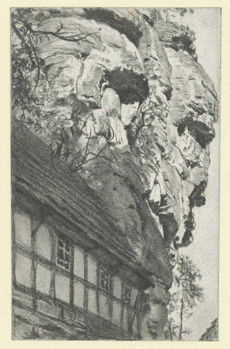 Umgebindehaus in Herrnskretschen vor Felsen
