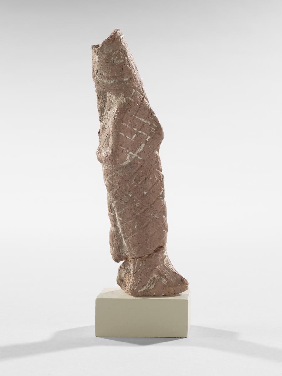 Statuette eines Mannes im Fisch-Gewand