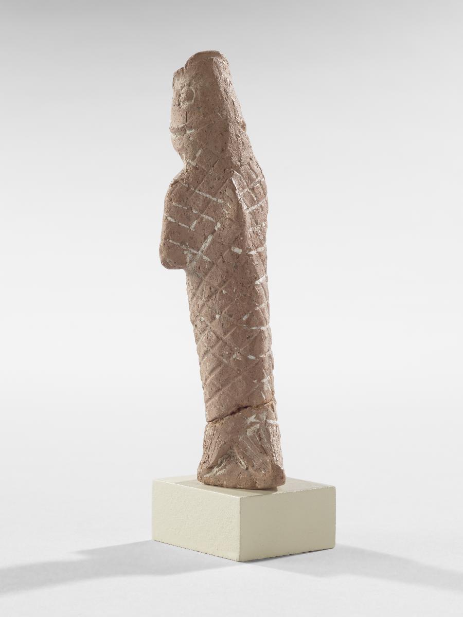 Statuette eines Mannes im Fisch-Gewand
