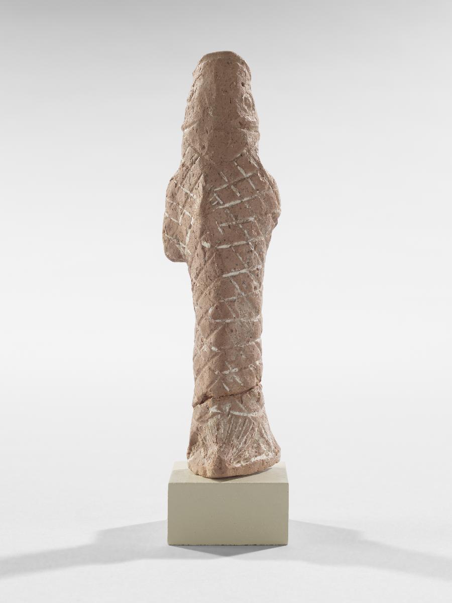 Statuette eines Mannes im Fisch-Gewand