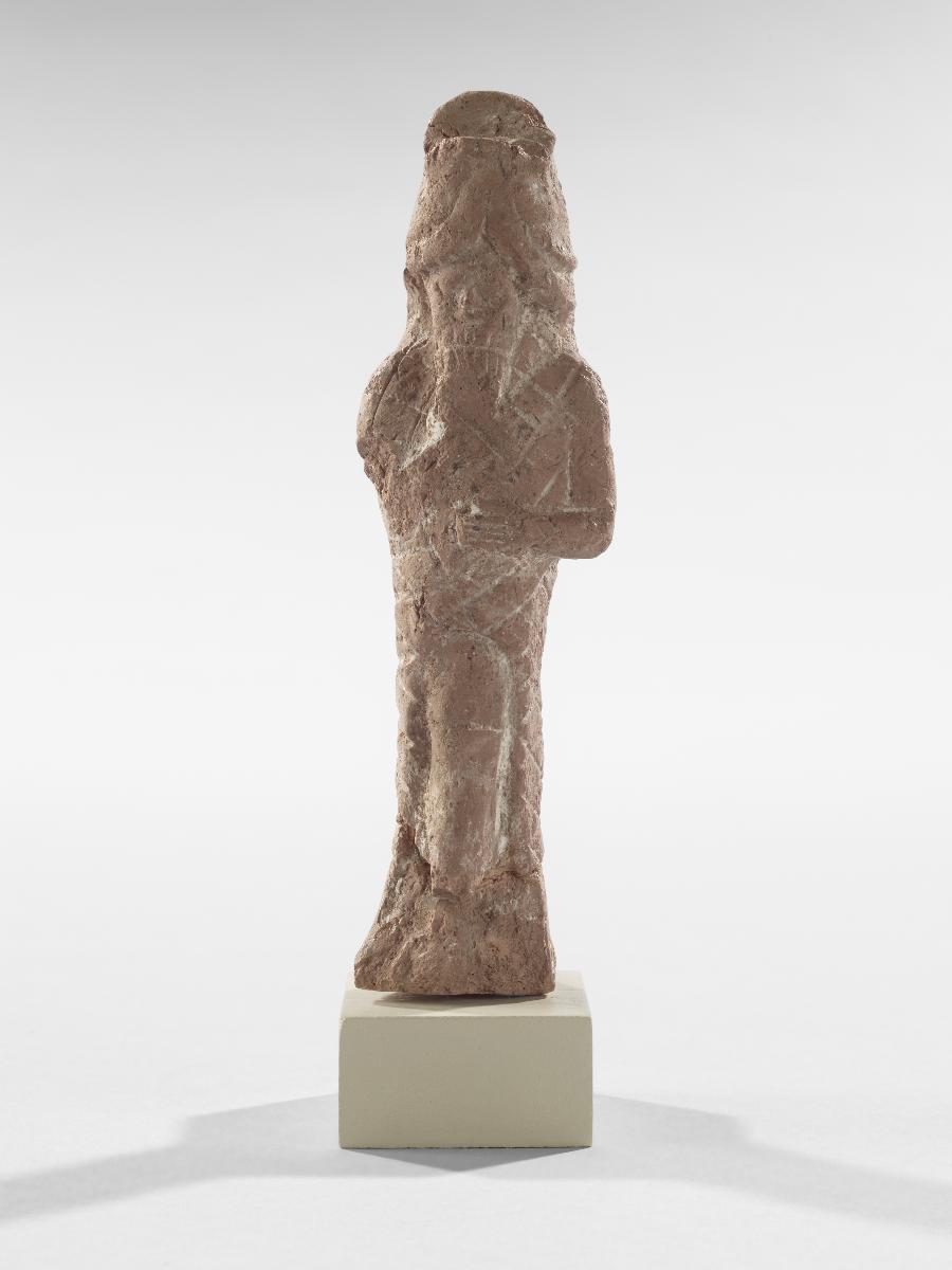 Statuette eines Mannes im Fisch-Gewand