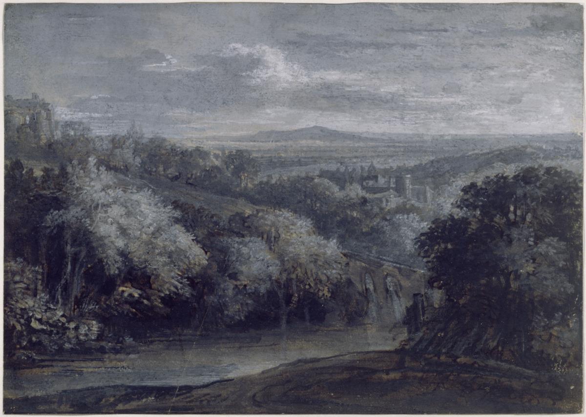 Weite Landschaft mit Stadt im Hintergrund