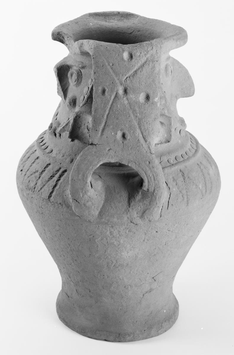 Amphora mit Gesicht