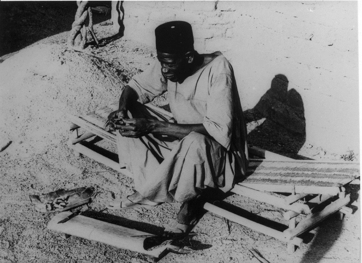 der Handwerker mit allem Gerät und Material