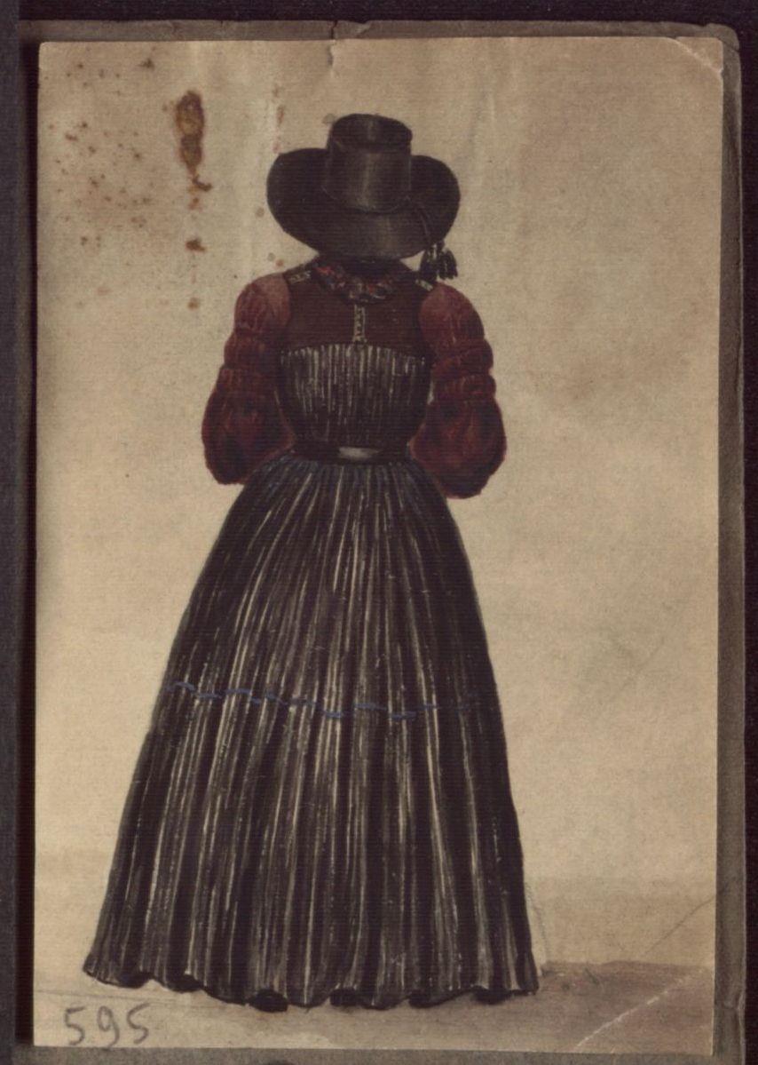 Rückenansicht einer Frau in Tracht