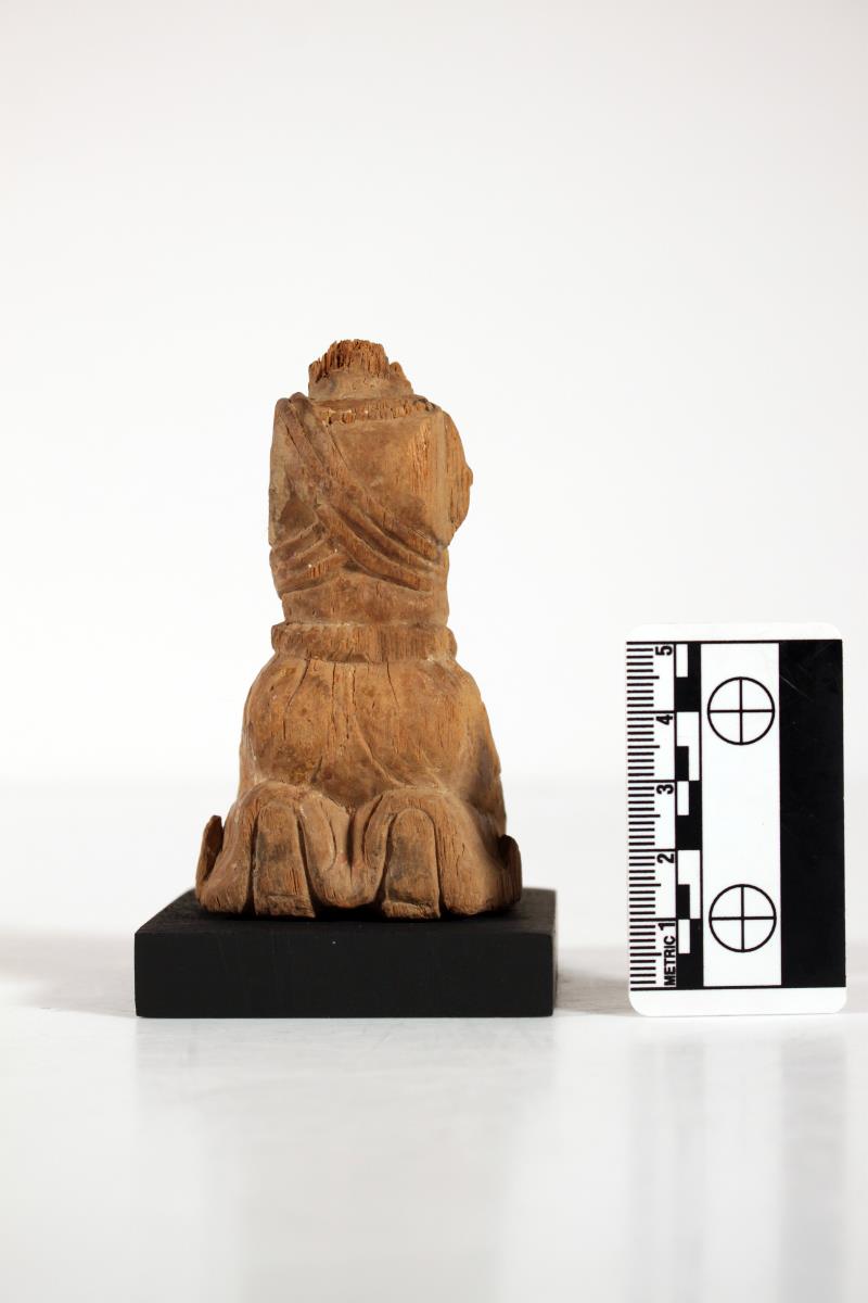 knieende kopflose Holzstatuette