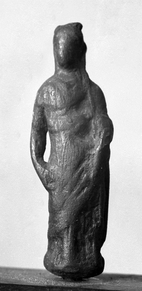 Weibliche Figur mit verschleiertem Hinterkopf