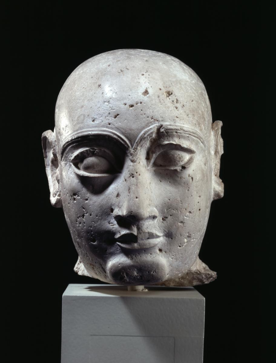 Kopf einer Männerstatuette