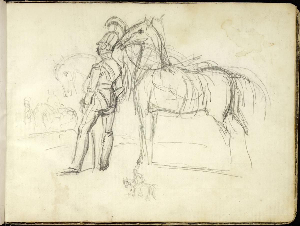 Reiter und Pferd beieinanderstehend
