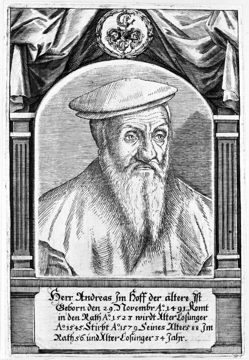Andreas Imhof im Rahmen mit allegorischen Figuren