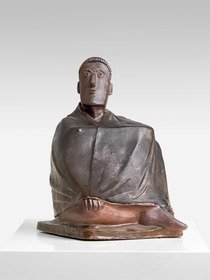 Sitzender Mann