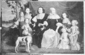 Familienporträt mit Hund und Stadtansicht