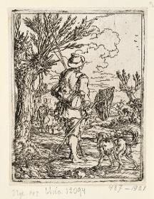 Angler mit Kescher und Hund