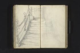 Treppe mit schmiedeeisernem Geländer