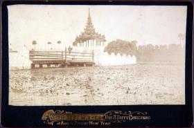 WITH BEST WISHES FOR A HAPPY CHRISTMAS AND A BRIGHT NEW YEAR. J.Beato. MANDALAY. 1113 The West Gate  City and Bridge over the Moat Mandalay.