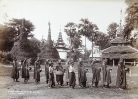 burmese hpongyees collecting alms. 530