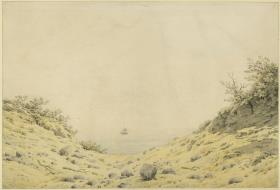 Blick durch Dünen auf das Meer