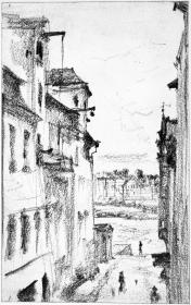 Blick durch eine Straße auf Gebäude hinter dem Fluss
