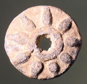 Durchbohrte Scheibe