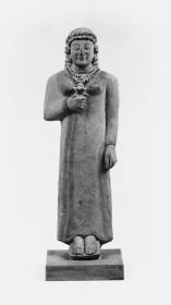 Weibliche Statuette mit Lotosblüte