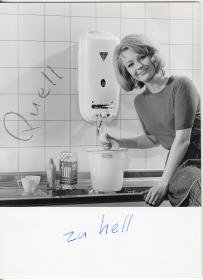 Junkers, Hausfrau mit Putzmitteln an Küchenspüle mit Gas-Durchlauferhitzer (Werbung für Junkers Quell)
