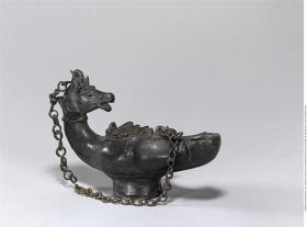 Lampe mit Pferdekopf am Griff