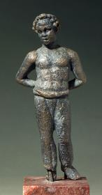 Römische Statuette eines Dunkelhäutigen oder Barbaren mit Hosen