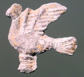 Taube mit ausgebreiteten Flügeln nach links
